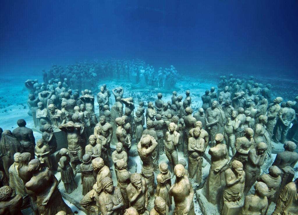 Underwater sculptures at Molinere Underwater Sculpture Park in Grenada